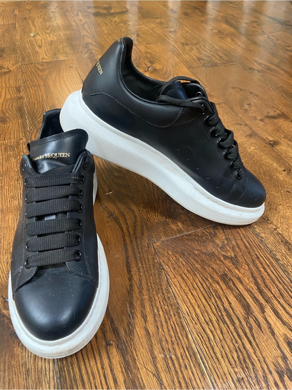 Alexander McQueen Black Leather Sneakers with White Platform Sole